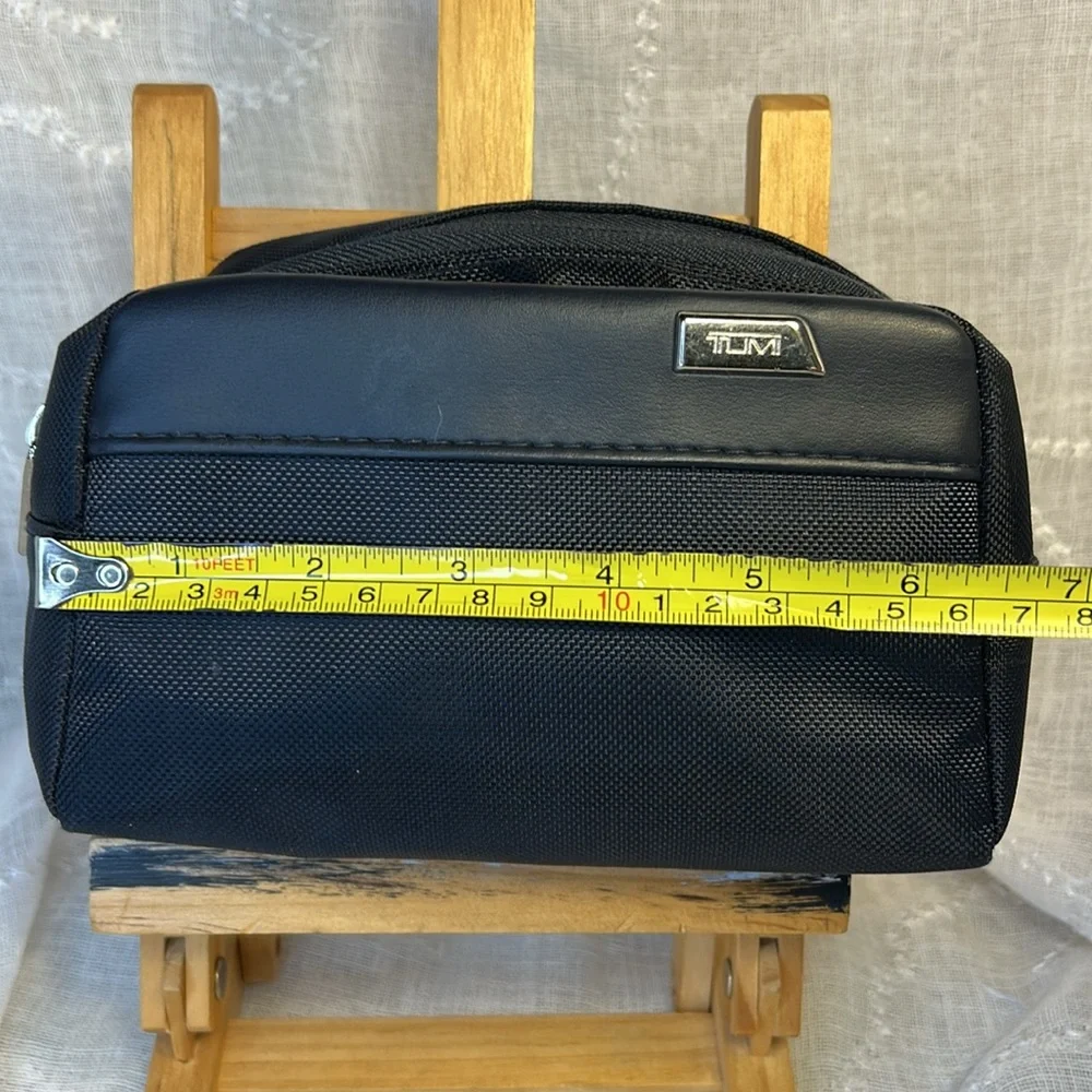 Tumi NWT cosmetic travel bag filled with goodies all new in packages